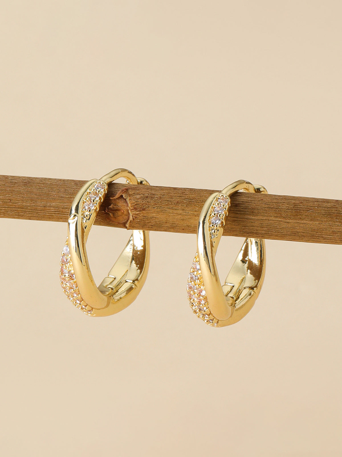 Zircon Accent Twisted Hoop Earrings