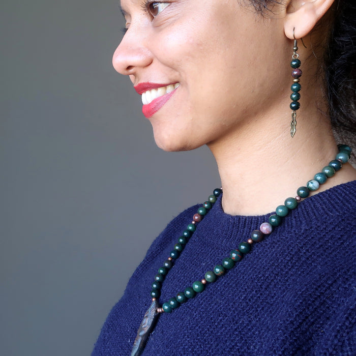 sheila of satin crystals wearing bloodstone goddess dangle earrings
