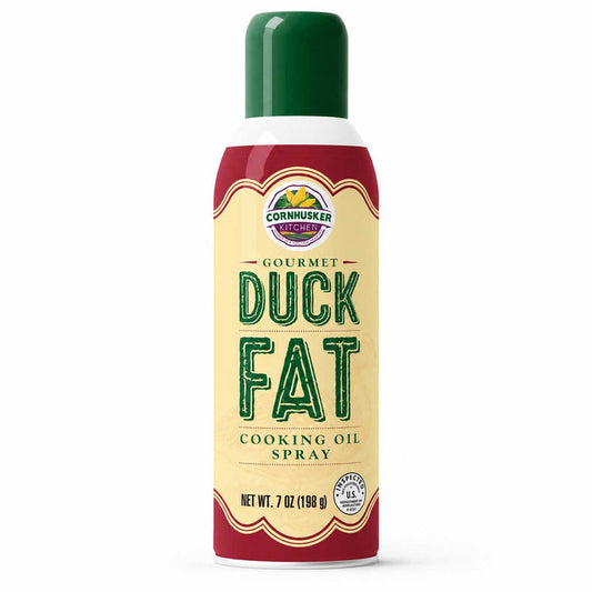 A 7 oz aerosol can of Cornhusker Kitchen Gourmet Duck Fat Cooking Oil Spray, featuring a cream-colored label with green lettering and a dark green cap, set against a plain white background.