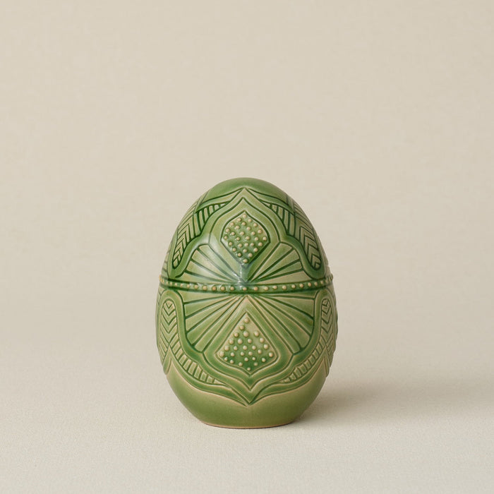 Handcrafted ceramic egg by Rookwood Pottery