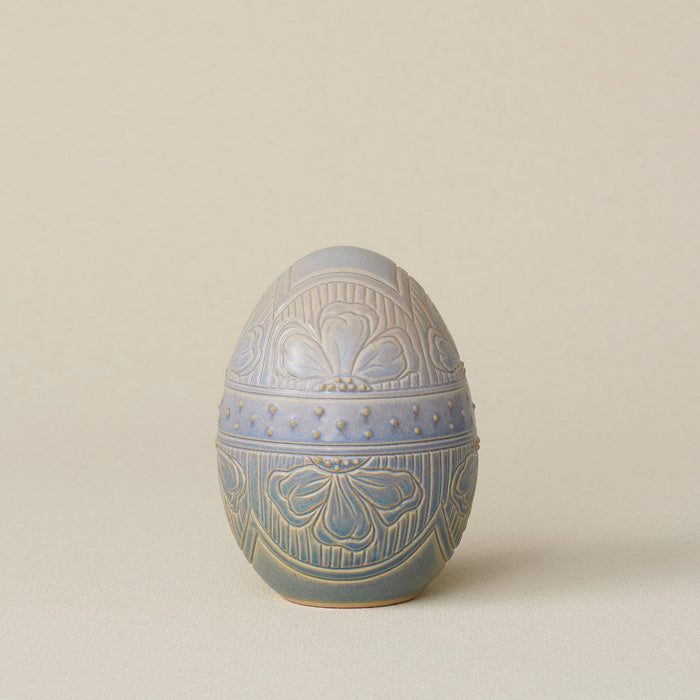 Handcrafted ceramic egg by Rookwood Pottery