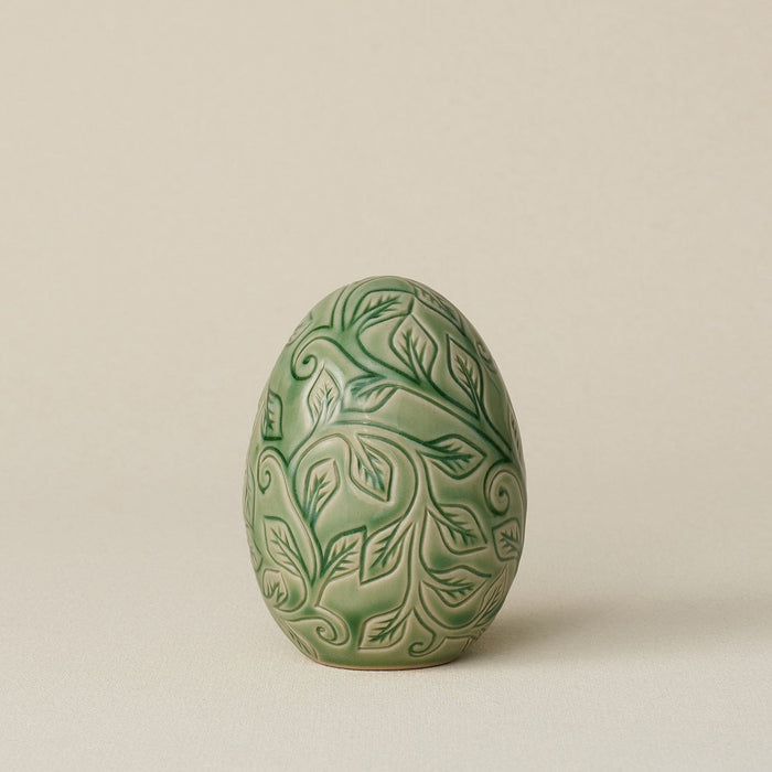 Handcrafted ceramic egg by Rookwood Pottery