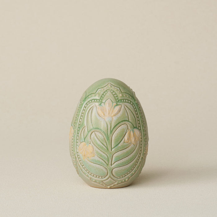 Handcrafted ceramic egg by Rookwood Pottery