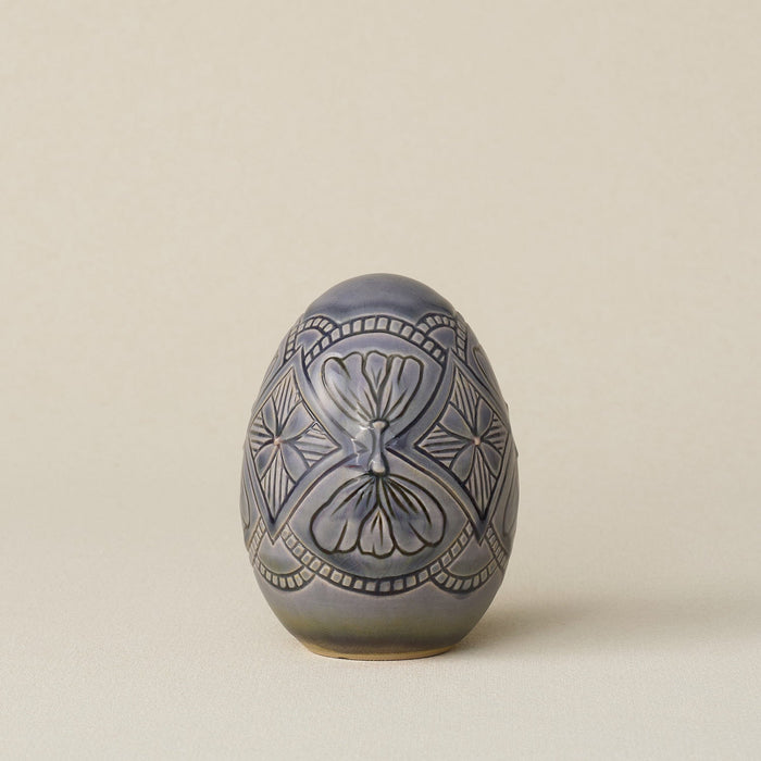 Handcrafted ceramic egg by Rookwood Pottery