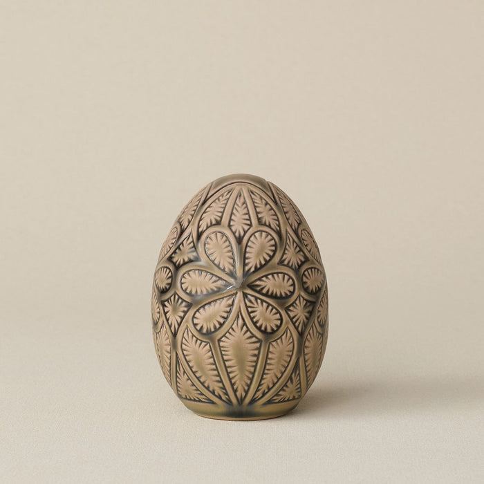 Handcrafted ceramic egg by Rookwood Pottery