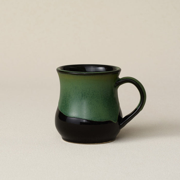 Hand-thrown ceramic mug by Rookwood Pottery