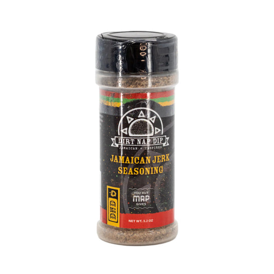 A bottle of Jamaican Jerk Seasoning by Mystic Rhoads Productions, 3.2 oz size, with a black cap and label featuring red and yellow stripes.