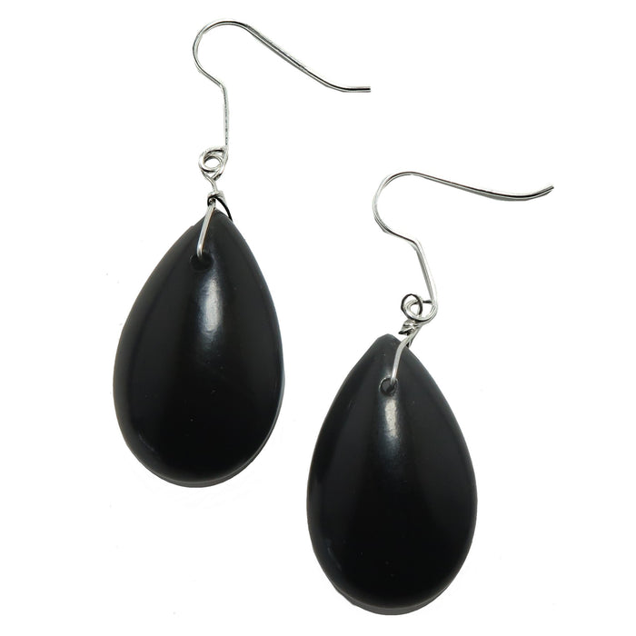 Black teardrop Jet stone earrings on silver hooks against a white background