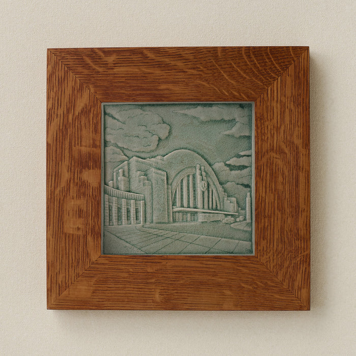 Rookwood Union Terminal City Scene art tile in a golden oak wood frame