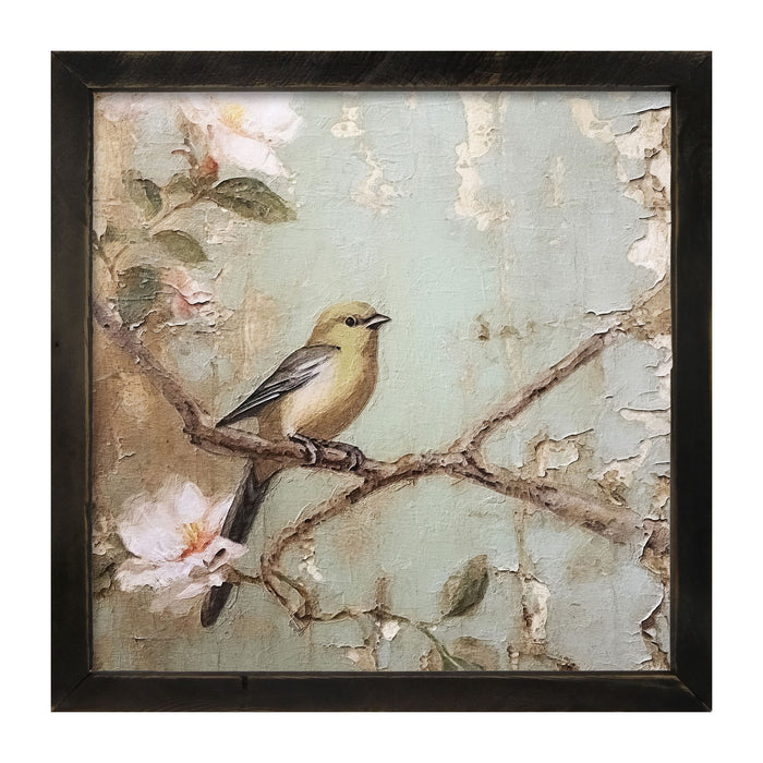 Yellow bird on branch